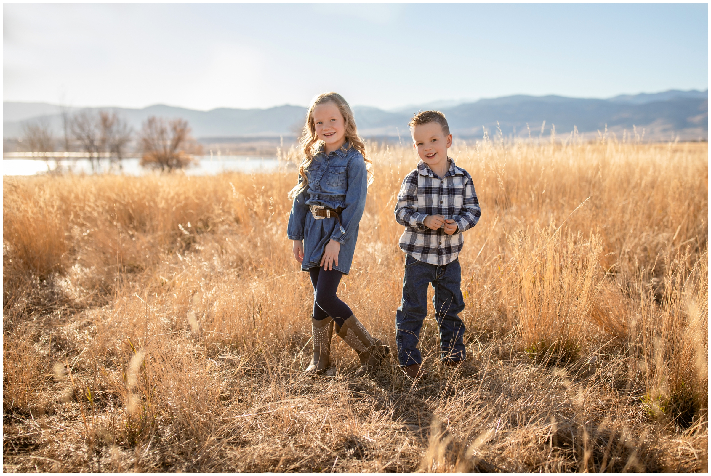 brother and sister posing in mountain field during Coot Lake Boulder family photos by Plum Pretty Photography 