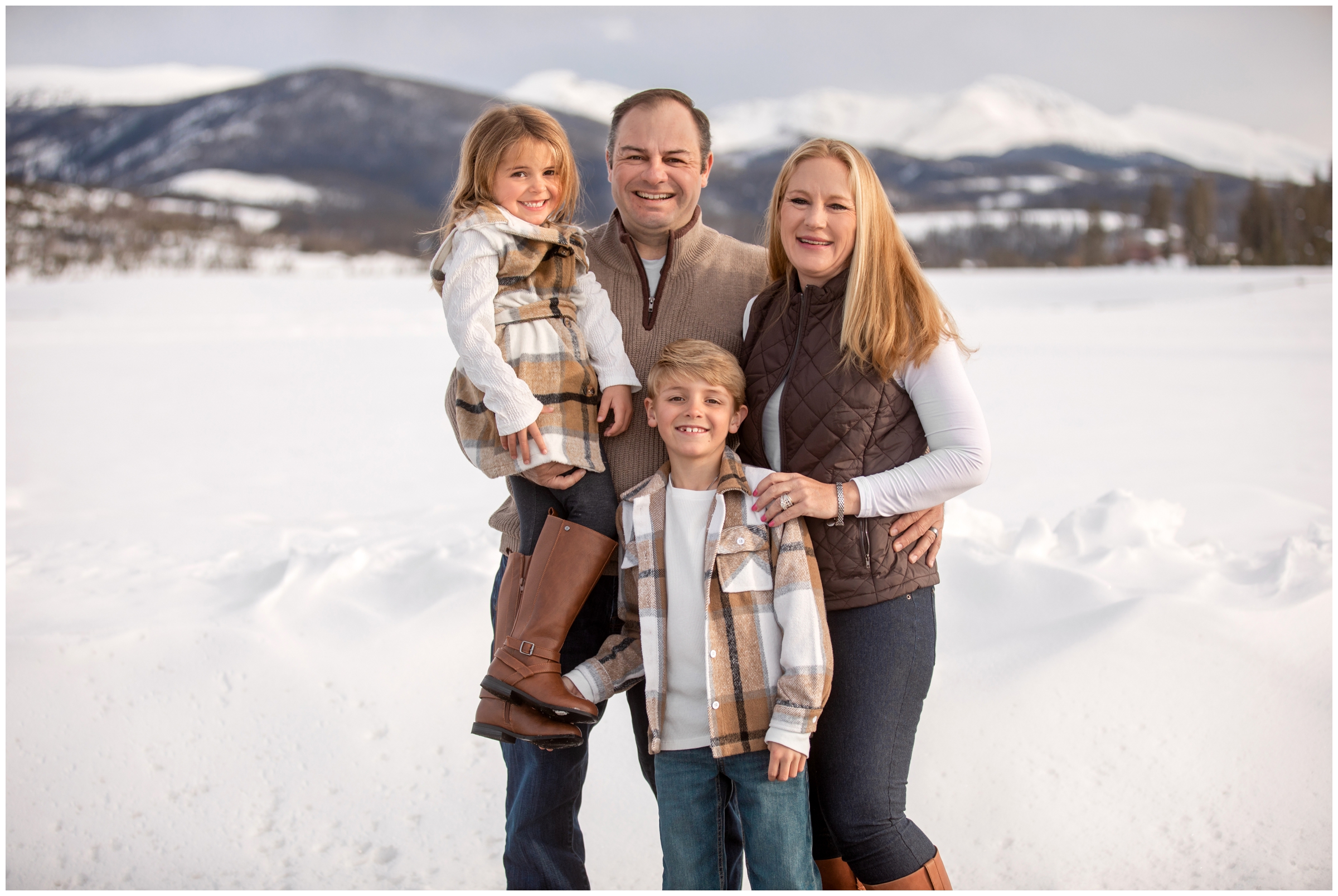 snowy mountain family pictures at Devil's Thumb Ranch by Winter Park photographer Plum Pretty Photography